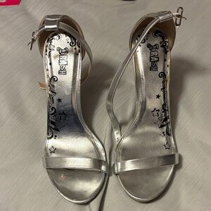 Brash Shiny Silver Ankle Strap Heels